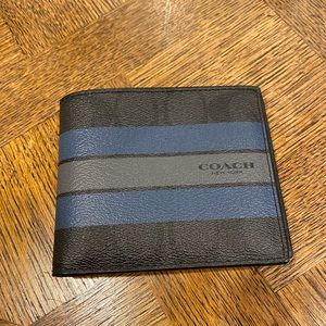 Men’s Coach wallet.
